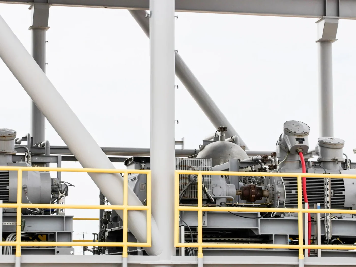 Process skid with pumps, piping and instrumentation on a structural frame